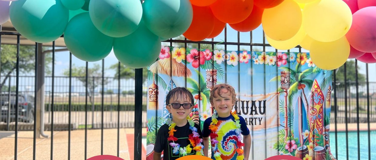 Summer camp in Plano TX children enjoying a luau-themed day at Palm Grove