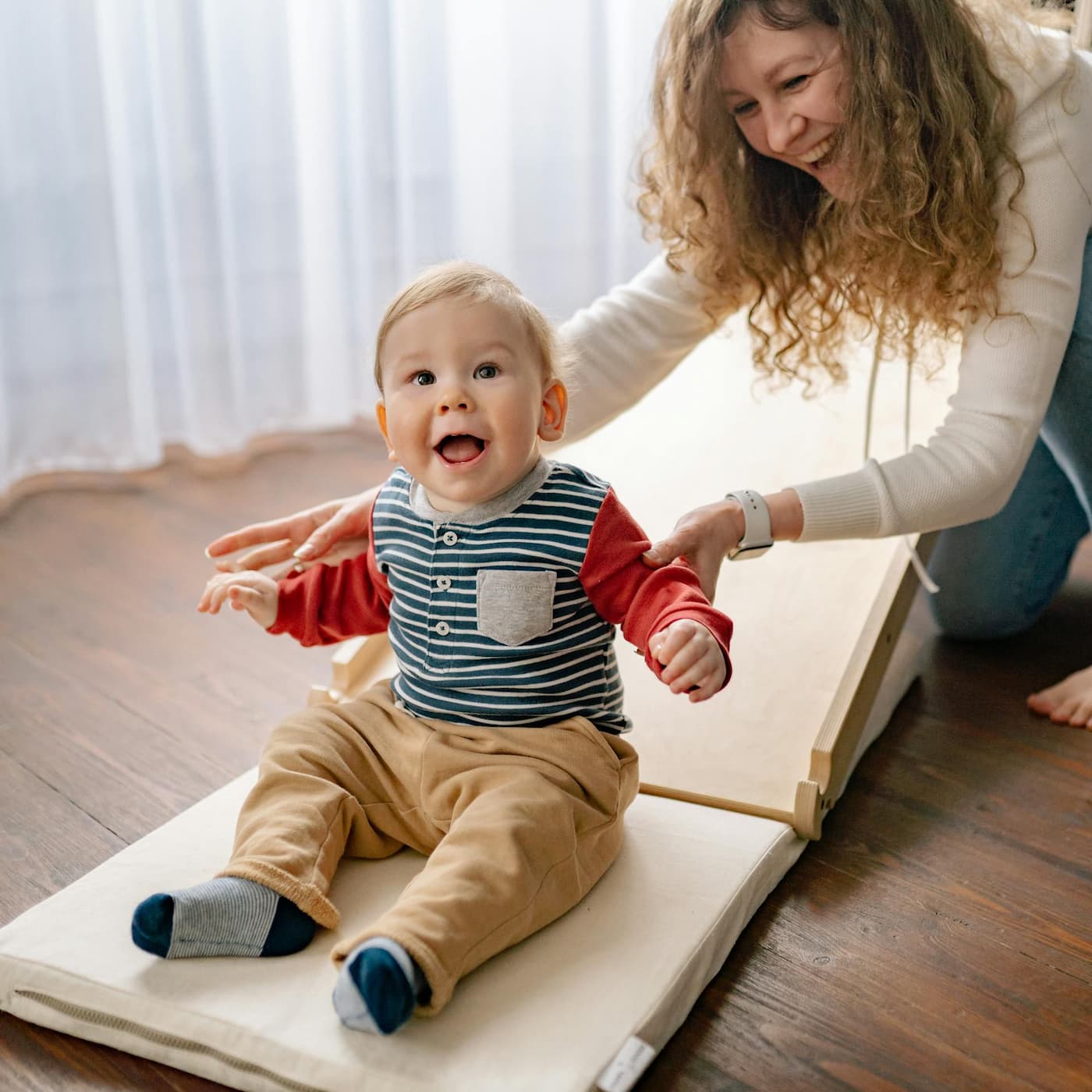 Infant Montessori class with caregiver at Palm Grove in Plano TX