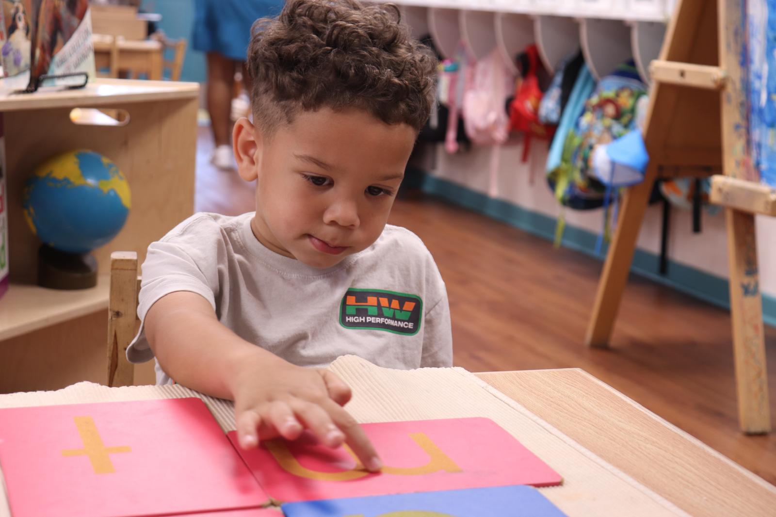 Montessori education philosophy in action at Palm Grove Plano TX classroom